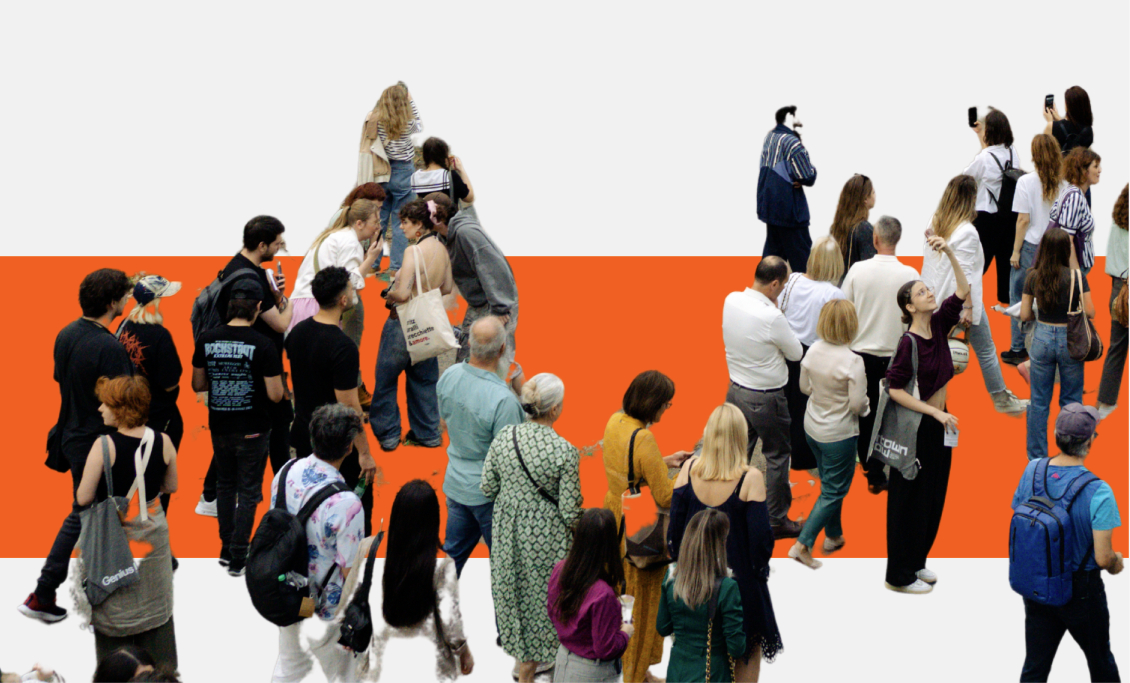 Group of people looking at a mural